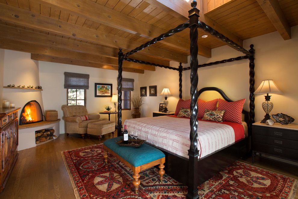 Homewise Santa Fe for a Southwestern Bedroom with a Red Southwestern Rug and Beautiful Santa Fe Bedrooms by Prull Custom Builders