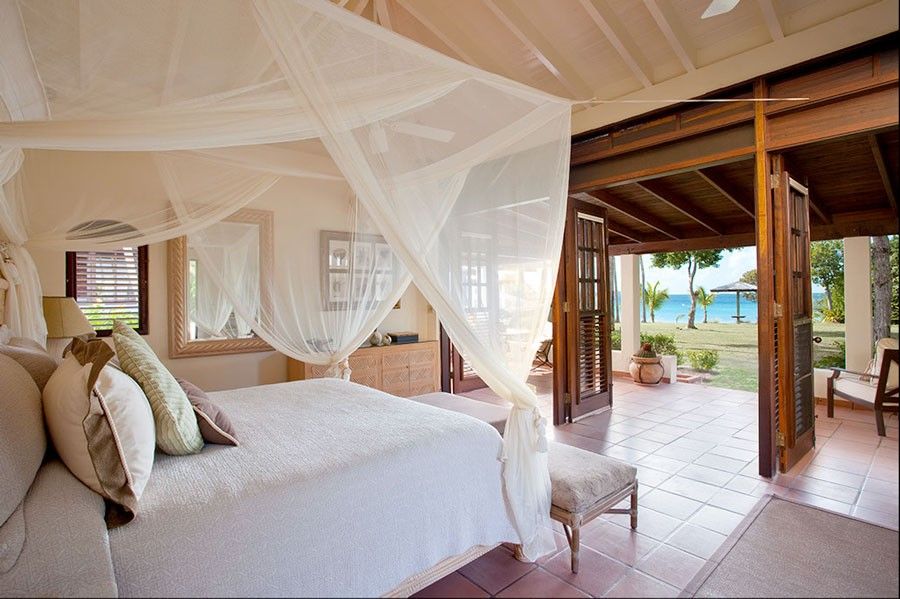 Hooks Chicken and Fish for a Tropical Bedroom with a Wood Ceiling and Bedroom Suite by Mcm Design