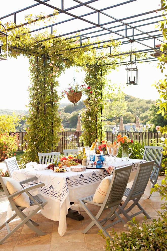 Hop Trellis for a Mediterranean Patio with a Outdoor Dining Area and Summit by Biglin Architectural Group