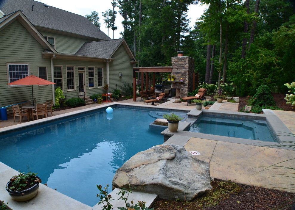 Hot Springs Spa Nc for a Traditional Pool with a Covered Patio and Raleigh Outdoor Living by the Pool by Down to Earth Designs, Inc.