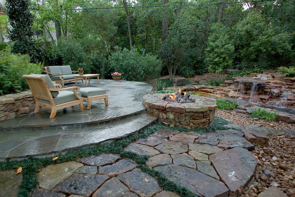 Hot Springs Spa Nc for a Tropical Patio with a Fire Pit and Natural Waterfall & Swimming Pool by Exterior Worlds Landscaping & Design