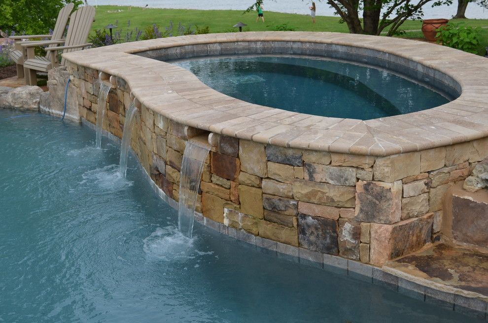 Hot Tubbing for a Traditional Pool with a Steps Into Pool and Lake Property with Infinity Edge Pool by the Easy Gardener