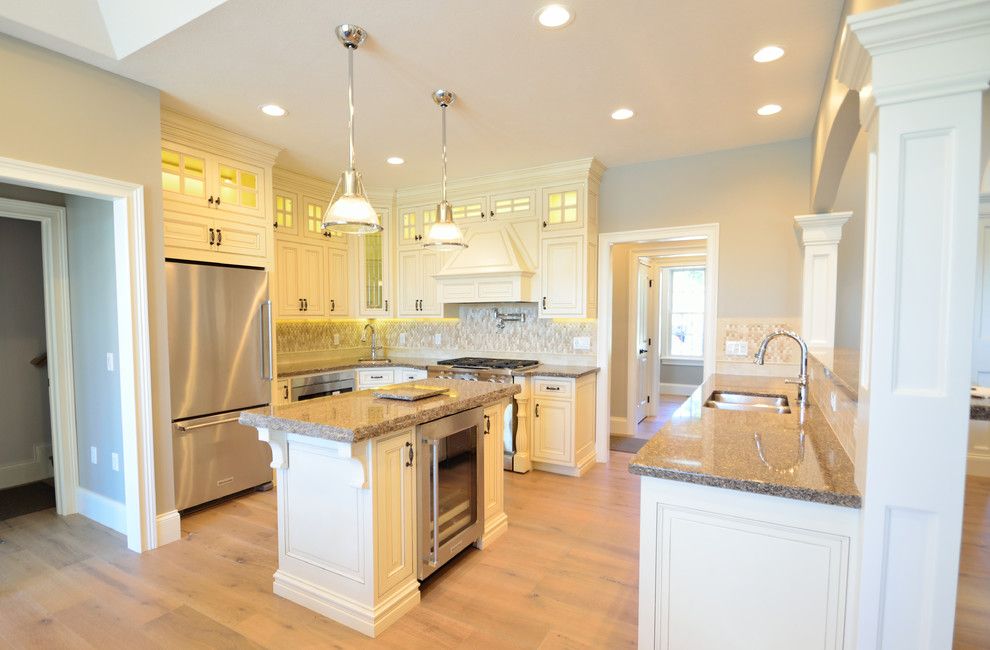 House Umber for a Transitional Kitchen with a Hidden Storage and Waterfront Kitchen by Wolff Kitchen & Bath