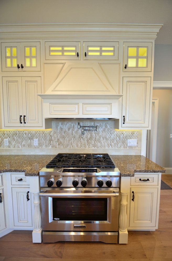 House Umber for a Transitional Kitchen with a Island and Custom Range Hood by Wolff Kitchen & Bath