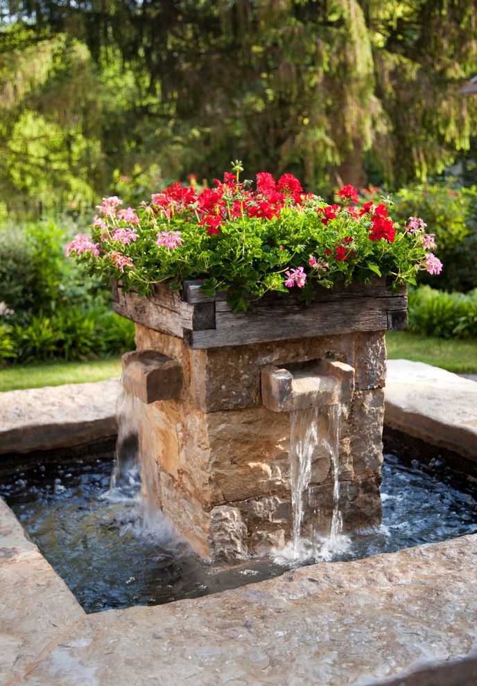 How Do Tankless Water Heaters Work for a Farmhouse Landscape with a Red Flowers and Cold Springs Farm by Period Architecture Ltd.