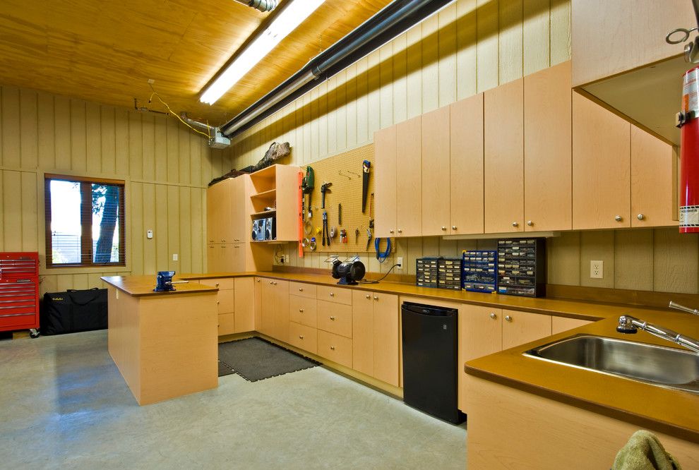 How Do Tankless Water Heaters Work for a Traditional Shed with a Concrete Floor and Sotheby's Canada by Lipsett Photography Group