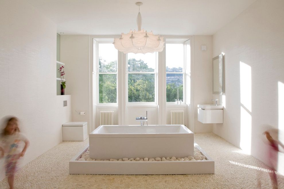 How to Clean Jetted Tub for a Modern Bathroom with a White Pebble Floor and Master en Suite   Bath, England by Deana Ashby   Bathrooms & Interiors