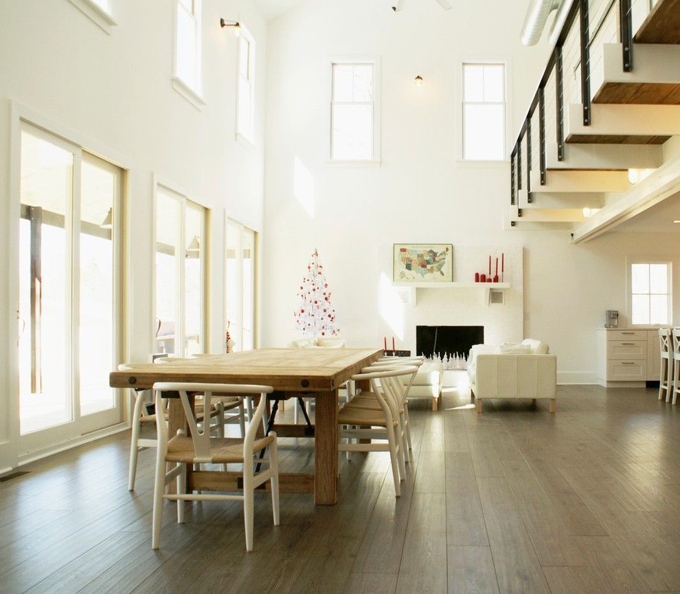 How to Clean Pergo Floors for a Farmhouse Dining Room with a White and Country Cathedral by Linton Architects