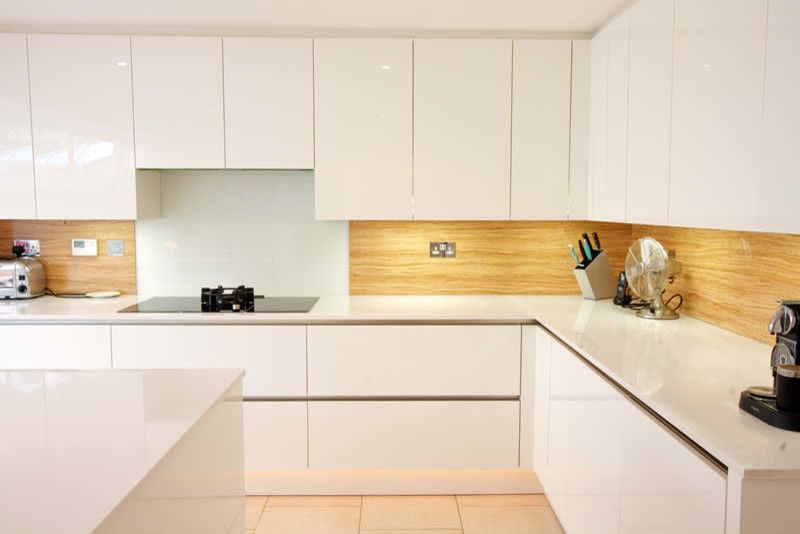 How to Cut Laminate Countertop for a Contemporary Kitchen with a Wood Splashback and Almond Wood Kitchen Splashback by Lwk Kitchens London