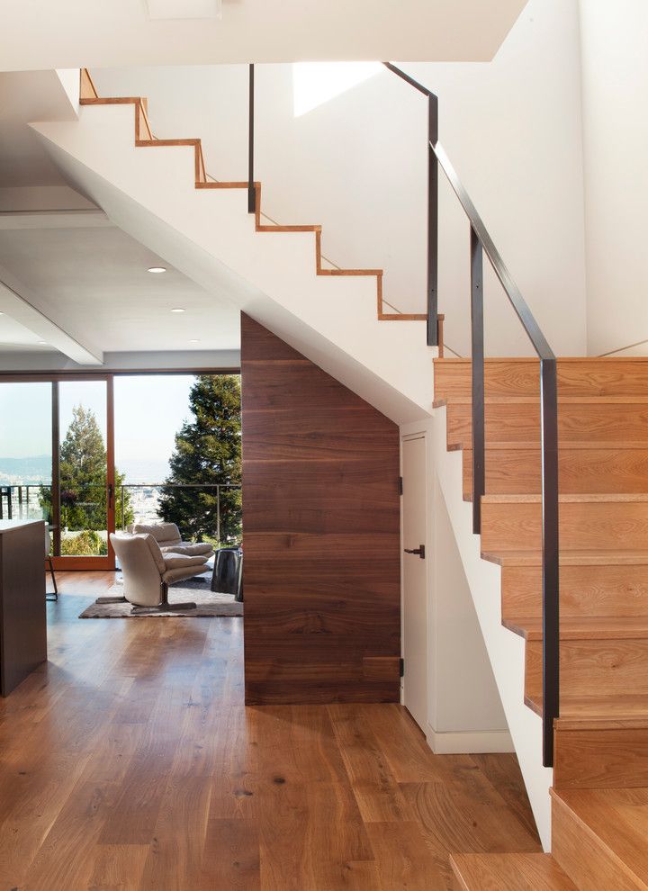 How to Fix a Hole in Drywall for a Contemporary Staircase with a Wood Tread and Quantum Windows & Doors | Mcelroy Architecture by Quantum Windows & Doors