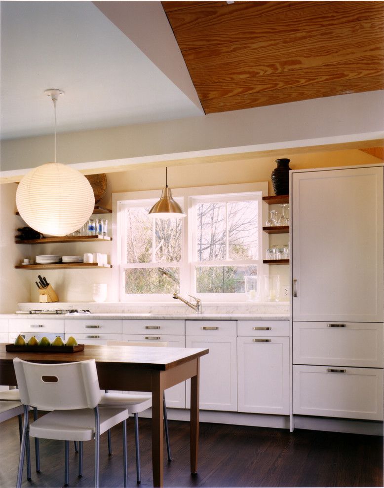 How to Hang Floating Shelves for a Rustic Kitchen with a Panel Refrigerator and Kitchen by Paul Rice Architecture