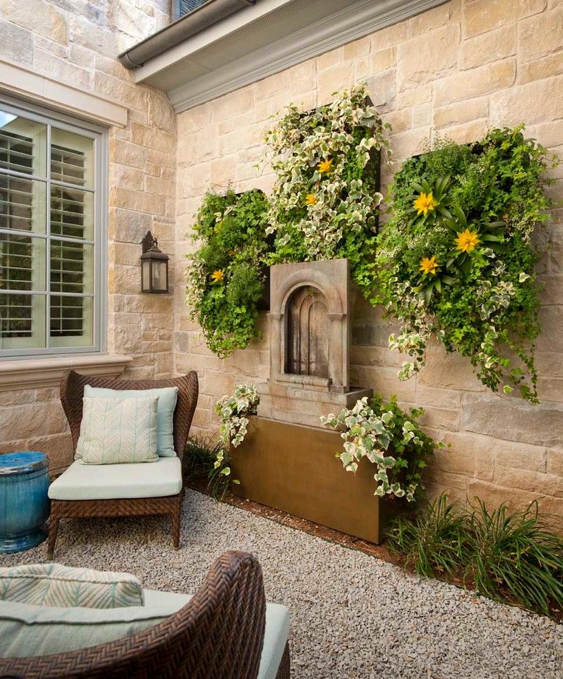 How to Hang Pictures on Plaster Walls for a Traditional Patio with a Planter Box and Lupton by Danes Custom Homes