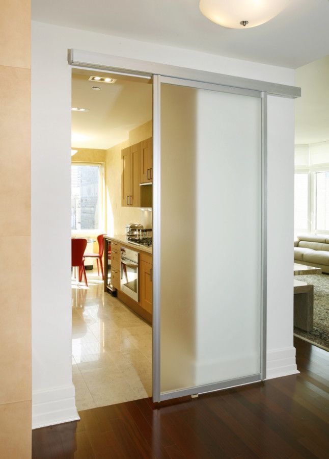 How to Install Bifold Doors for a Contemporary Kitchen with a Nyc Apartment and Frosted Sliding Door by Disalvo Interiors