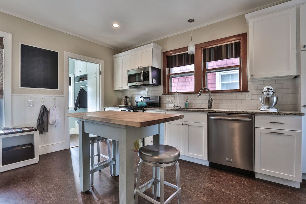 How to Install Pergo Flooring for a Traditional Kitchen with a Double Hung Window and Lawrence Street by Wendy Hynes