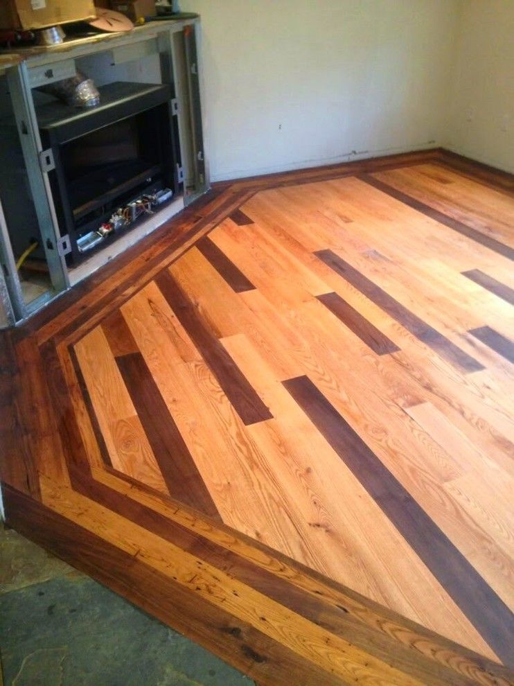 How to Lay Hardwood Floors for a Modern Living Room with a Hardwood Floor and Custom Multi Species in Layed Hardwood Floor by Colorado Custom Floors
