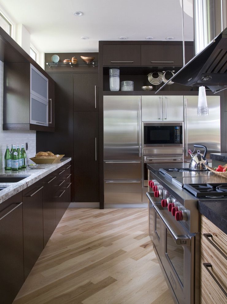 How to Lay Laminate Floor for a Contemporary Kitchen with a Dark Stained Cabinets and Hilltop Contemporary by Exquisite Kitchen Design