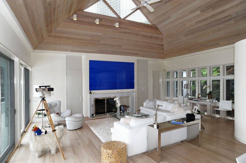 How to Lay Laminate Floor for a Contemporary Living Room with a Blue Artwork and Hamptons Modern Living Room by Susanne Kelley Design