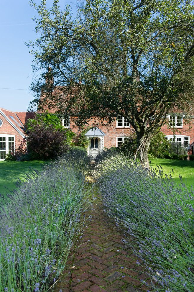 How to Lay Pavers for a Farmhouse Landscape with a Brick Path and Ashtree Cottage by Absolute Architecture & English Cross