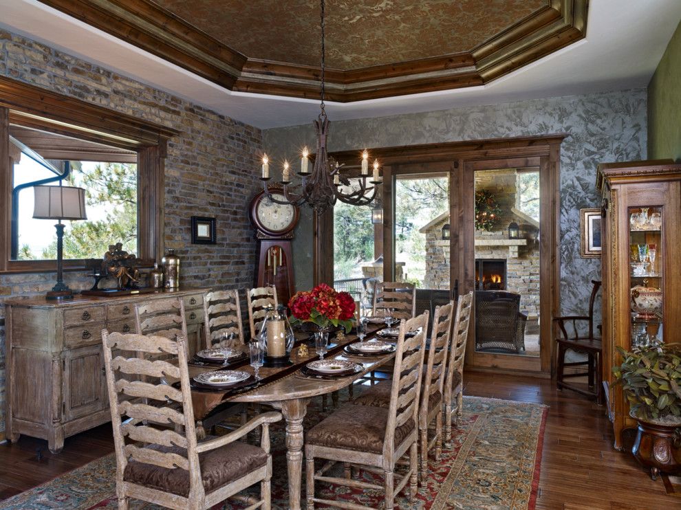 How to Move a Grandfather Clock for a Rustic Dining Room with a Fireplace and Colorado Mountain Territorial Style by Gayle Berkey Architects