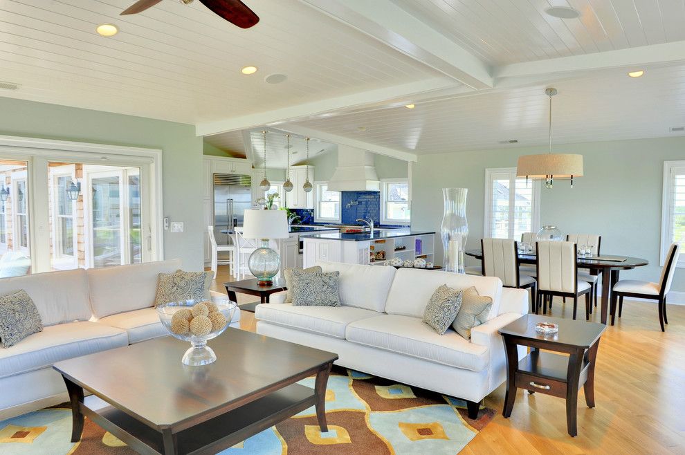 How to Paint a Popcorn Ceiling for a Beach Style Living Room with a Area Rug and Living Room by Echelon Custom Homes