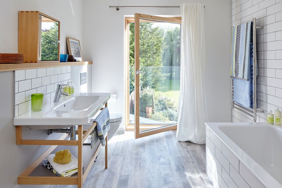 How to Refinish Wood Floors for a Contemporary Bathroom with a Towel Rail and Contemporary Country House in Berkshire by Lucy Crockett Design