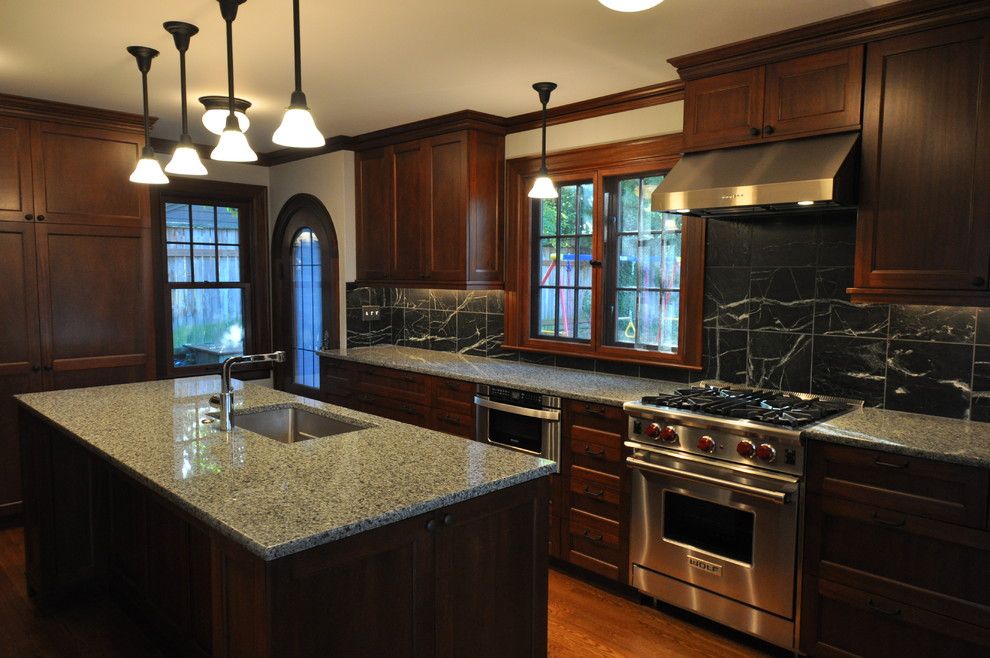 How to Restain Wood for a Traditional Kitchen with a Oven Hood and Tudor Kitchen by Ventana Construction Llc