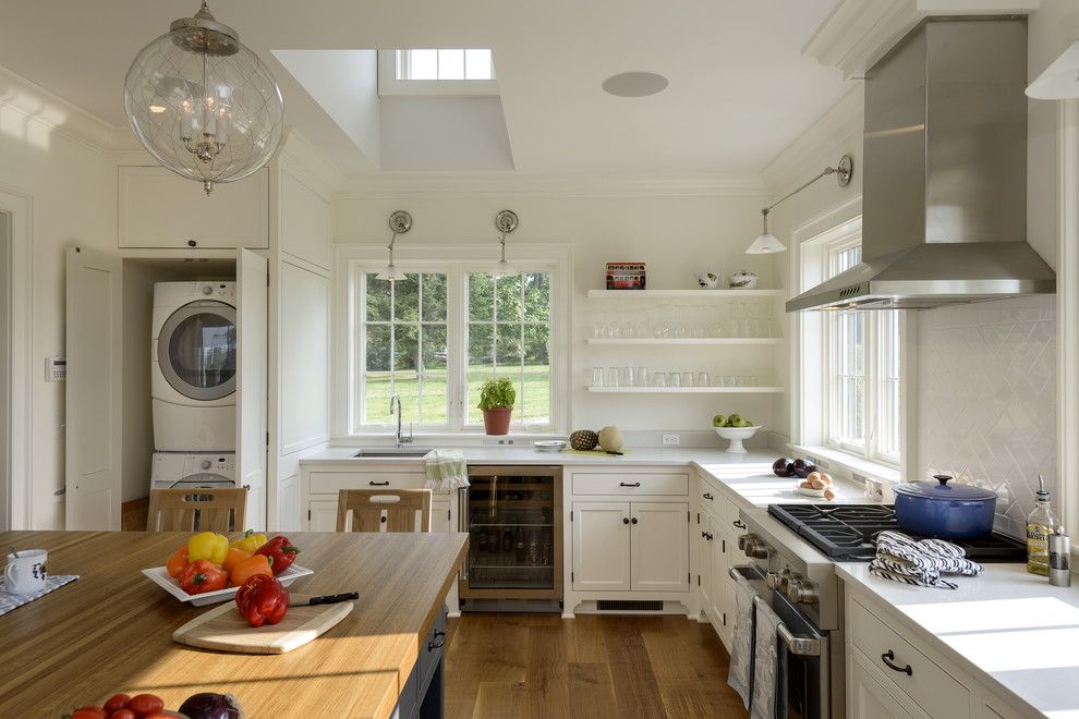 Hudson Appliance for a Farmhouse Kitchen with a Laundry in Kitchen and Pool House in the Country by Crisp Architects