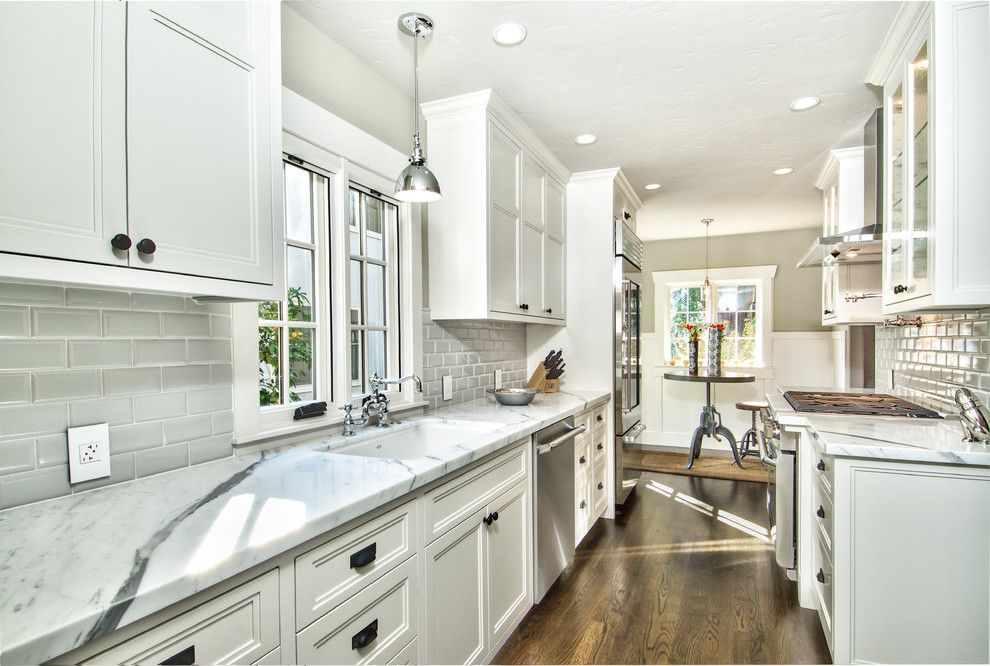 Hudson Appliance for a Traditional Kitchen with a Bridge Faucet and Land Park Tudor Revival by Creative Eye Design + Build, Leed Ap, Cgbp