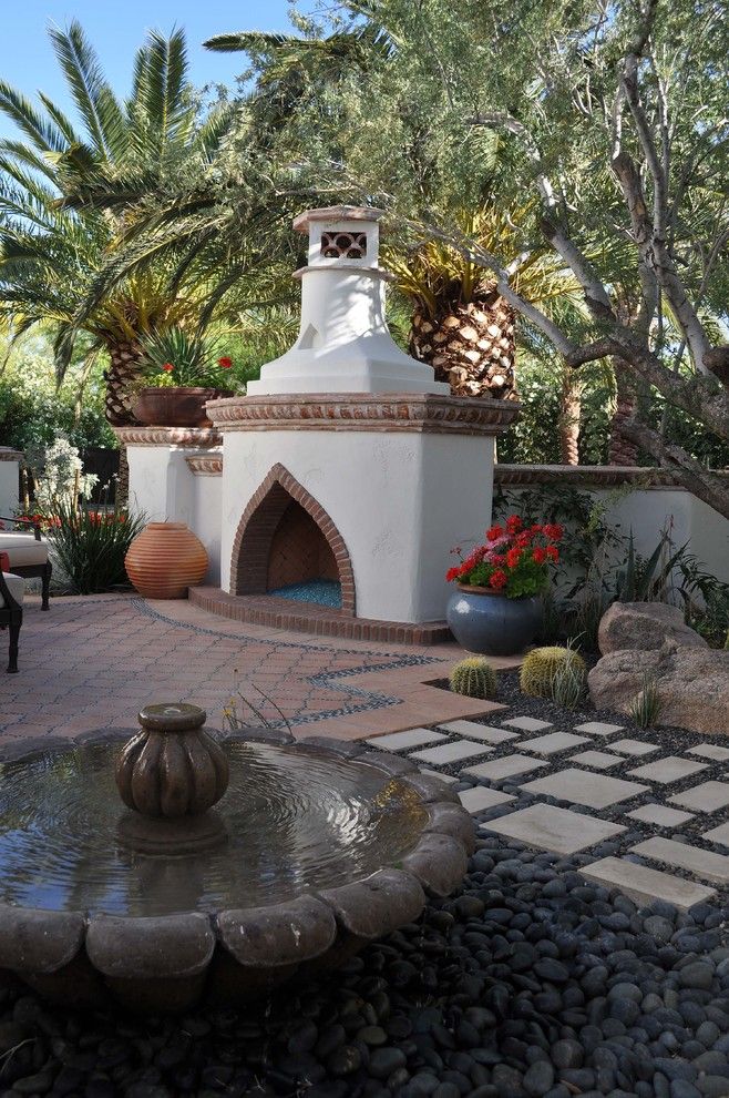 Huntington Beach Fire Pits for a Southwestern Patio with a Palm Trees and Transitional Home by Wendy Black Rodgers Interiors