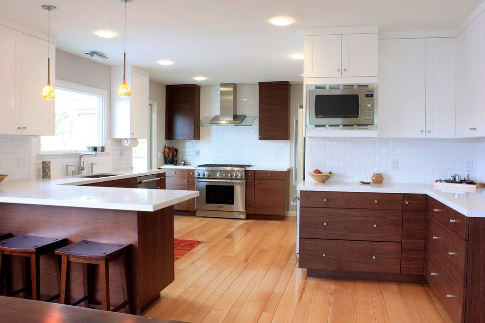 Huppe for a Contemporary Kitchen with a White Counters and Super Clean Contemporary Kitchen by Paragon Kitchen & Bath Studio