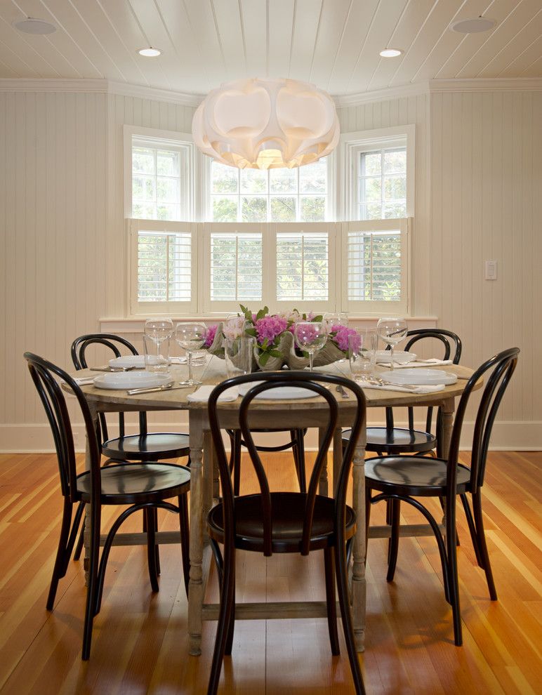 Ikea Folding Chair for a Rustic Dining Room with a Round Dining Table and Martha's Vineyard Dining Room by Schranghamer Design Group, Llc