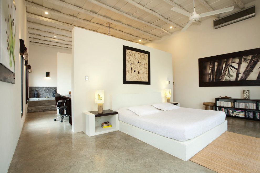 Ikea Lack Side Table for a Modern Bedroom with a Wood Ceiling Beams and Casa Kanda by Abc Real Estate Costa Rica