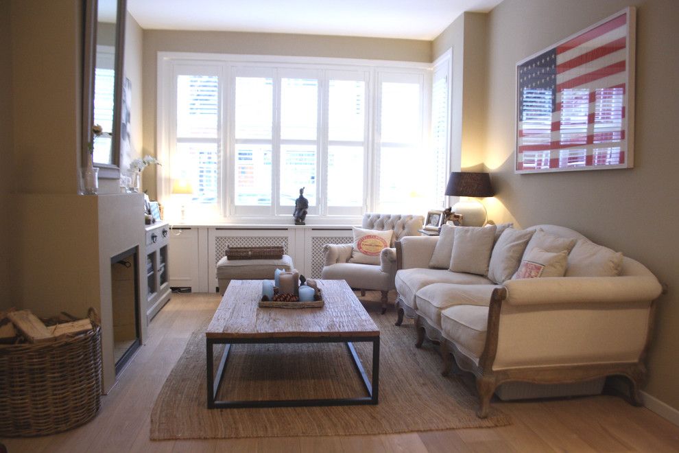 Ikea Lack Side Table for a Traditional Living Room with a Natural Wood Floor and Houzz Tour: Cheerful Family Home Shines with Vintage Touches by Holly Marder