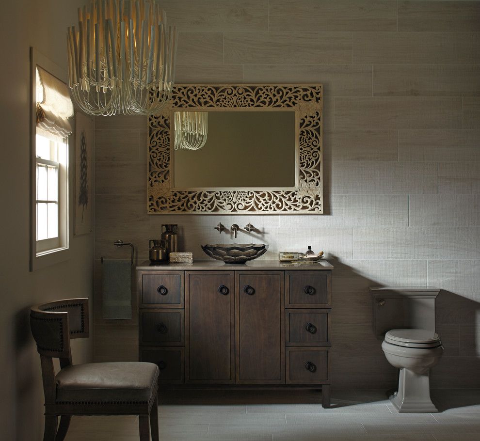 Ikea Malm 6 Drawer Dresser for a Traditional Bathroom with a Carved Mirror and Kohler by Kohler