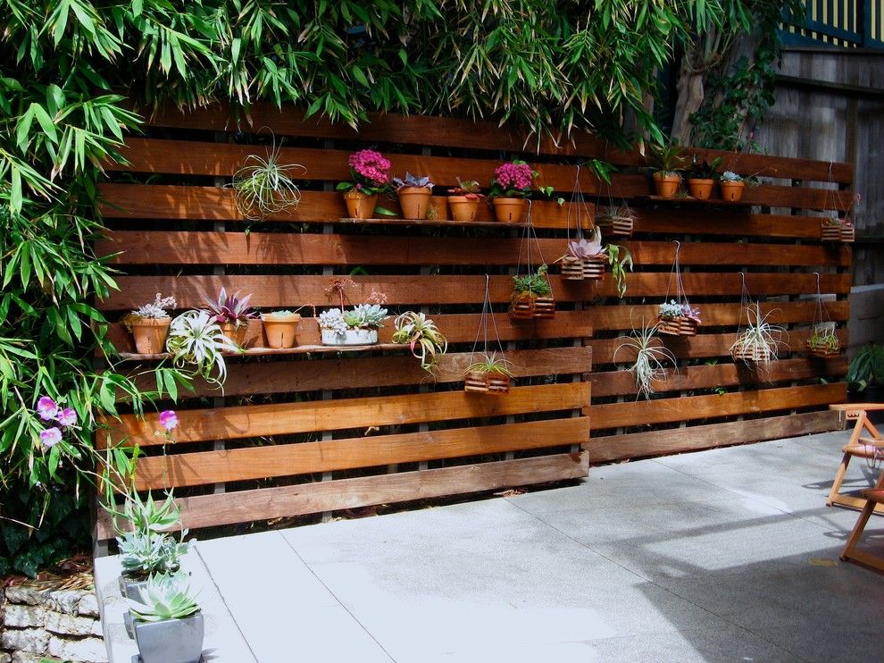 Ikea Planters for a Modern Patio with a Wood Slat Wall and Mtla   Broida Residence by Mtla  Mark Tessier Landscape Architecture