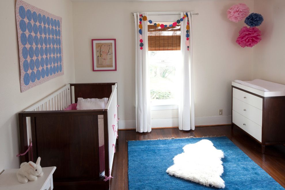 Ikea Sniglar Crib for a Modern Kids with a Blue Ikea Rug and Childrens' Rooms by Lindy Williams Interiors