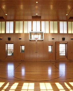 Indoor Basketball Courts Nyc for a Traditional Spaces with a Custom Wood Ceiling and Private Indoor Basketball Court by South Shore Millwork