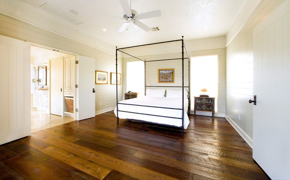 Installing a Wood Stove for a Rustic Bedroom with a Wood Flooring and Angelwylde House by Webber + Studio, Architects