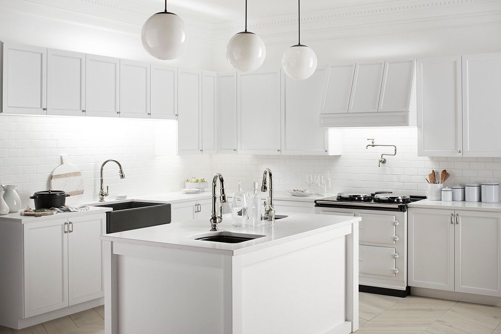 Installing a Wood Stove for a Traditional Kitchen with a 3x6 Subway Tile and Carefully Curated Kitchen by Kohler