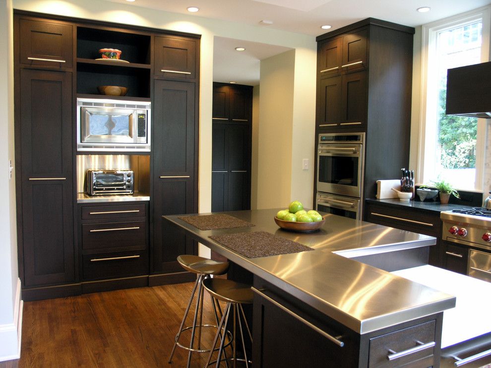 Installing Laminate Countertops for a Contemporary Kitchen with a Dark Brown Drawers and Modern Sleek Kitchen by Dci Home Resource