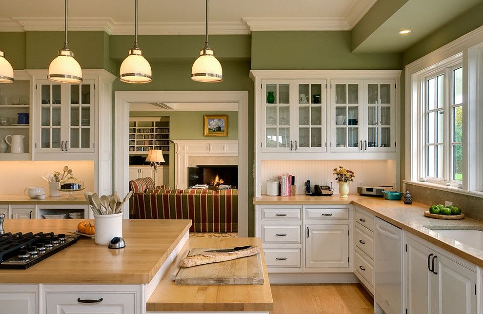 Installing Laminate Countertops for a Traditional Kitchen with a Green Walls and Crisp Architects by Crisp Architects