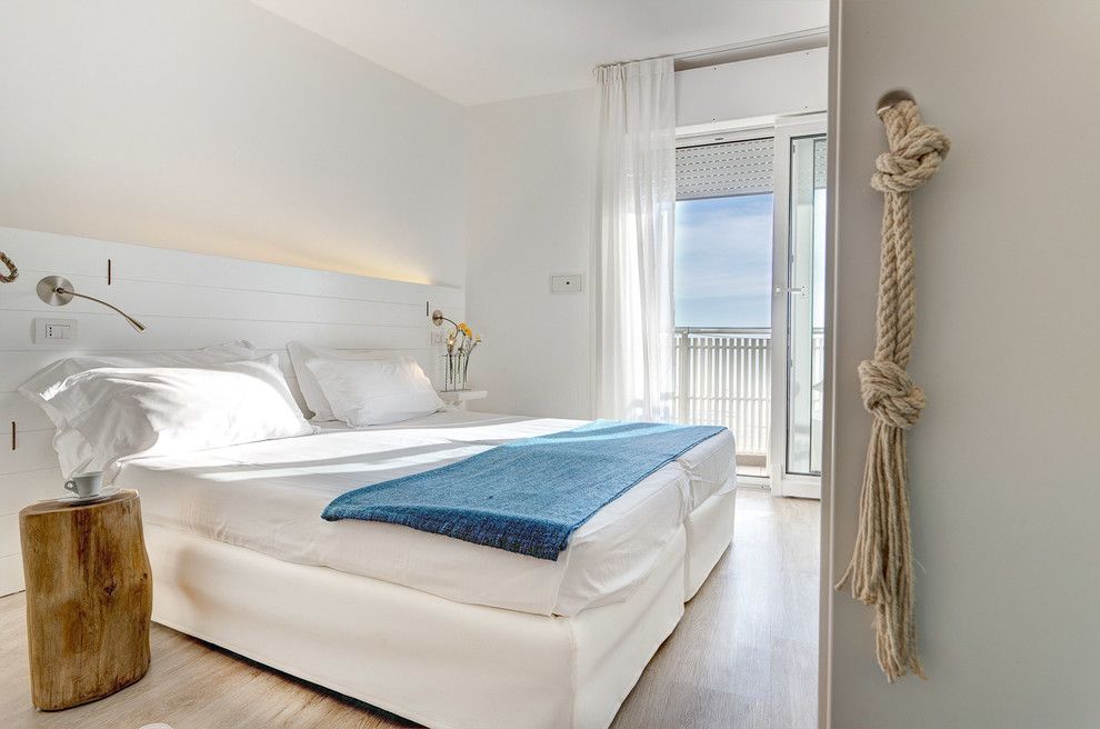 Ippolitos for a Beach Style Bedroom with a Beach Style and Hotel Solemare   Cervia (Ra) by Luca Ippolito