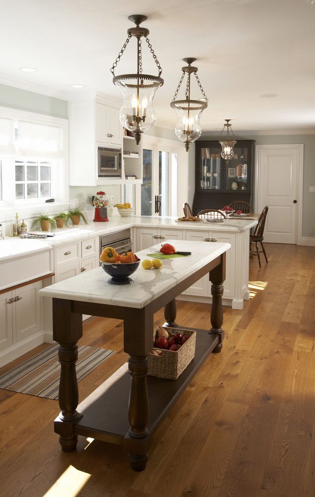 Jadon for a Traditional Kitchen with a Hardwood Floor and Tiburon Home Remodel by Mahoney Architects & Interiors