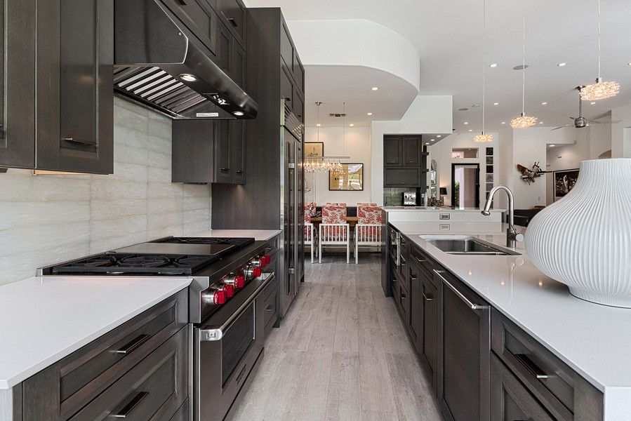 Jasper Johns Flag for a Transitional Kitchen with a Grey Stain and Loch Lomond by Kbc of Palm Springs