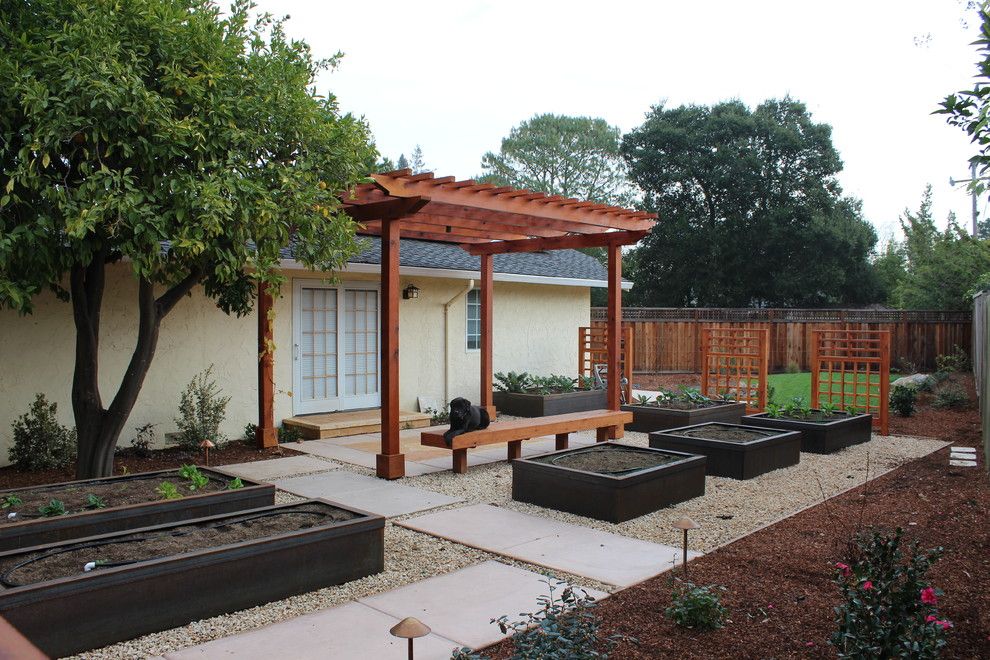 Jolee for a Asian Landscape with a Colored Concrete and Veggie Beds by Lifescape Custom Landscaping, Inc.