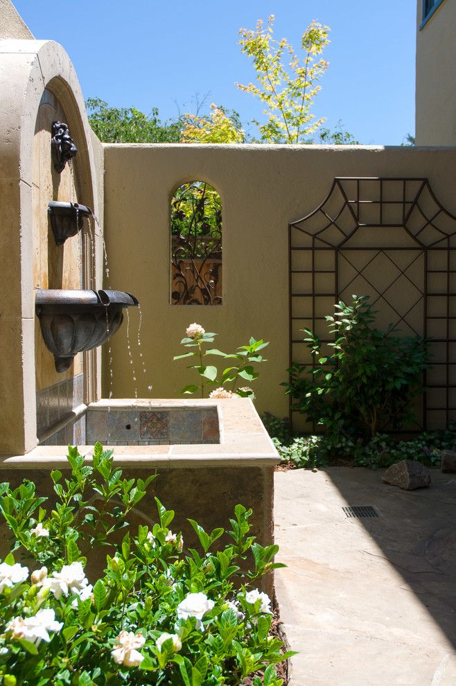 Jolee for a Mediterranean Landscape with a Stucco and Exteriors by Harrell Remodeling, Inc.