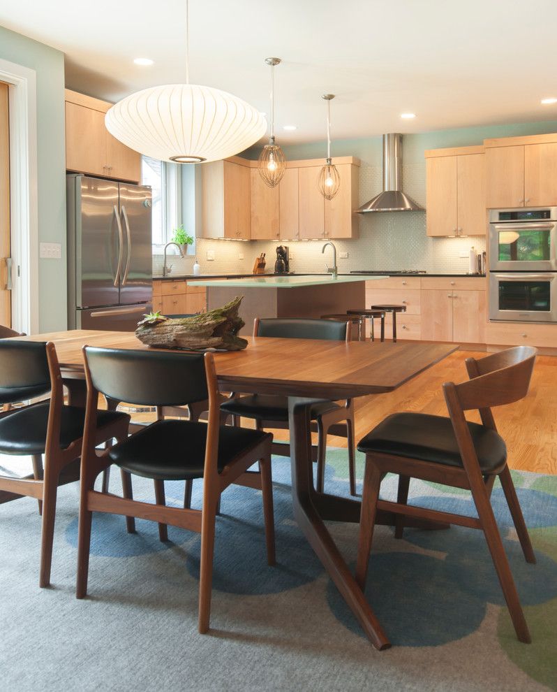 Kamps Pallets for a Modern Kitchen with a Glass Counter and Stone Avenue, La Grange Park by Malay Homes Inc.