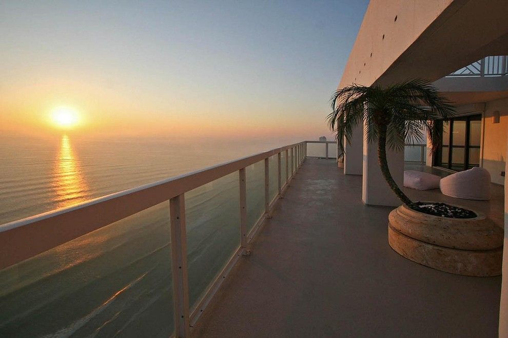 Kb Homes Orlando for a Contemporary Patio with a Glass Railing and Oceanfront Penthouse by Pathfinder Group Designs Inc.