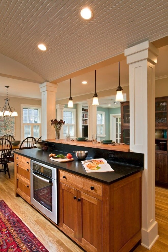 Kelly Van Halen for a Eclectic Kitchen with a White Cabinets and Charming Revival by Teakwood Builders, Inc.