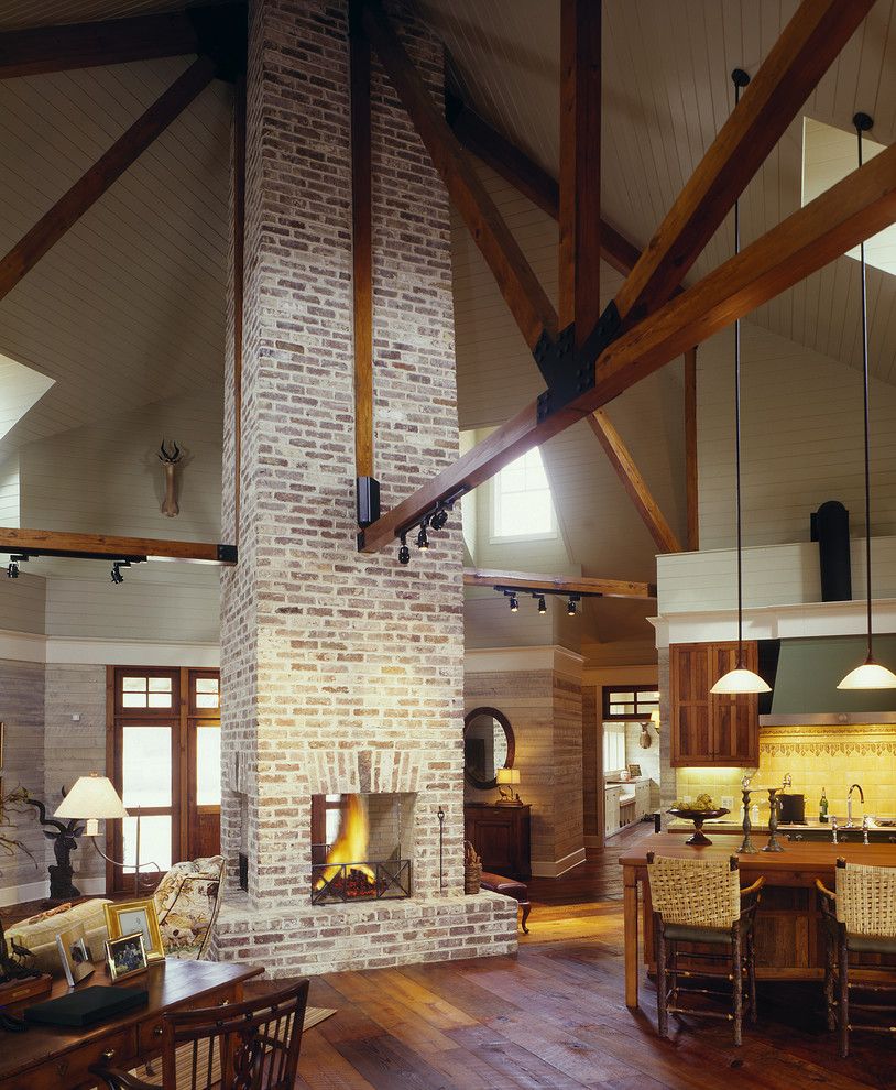 Ken Burns Prohibition for a Farmhouse Living Room with a Kitchen Island and Lowcountry River House by Frederick + Frederick Architects